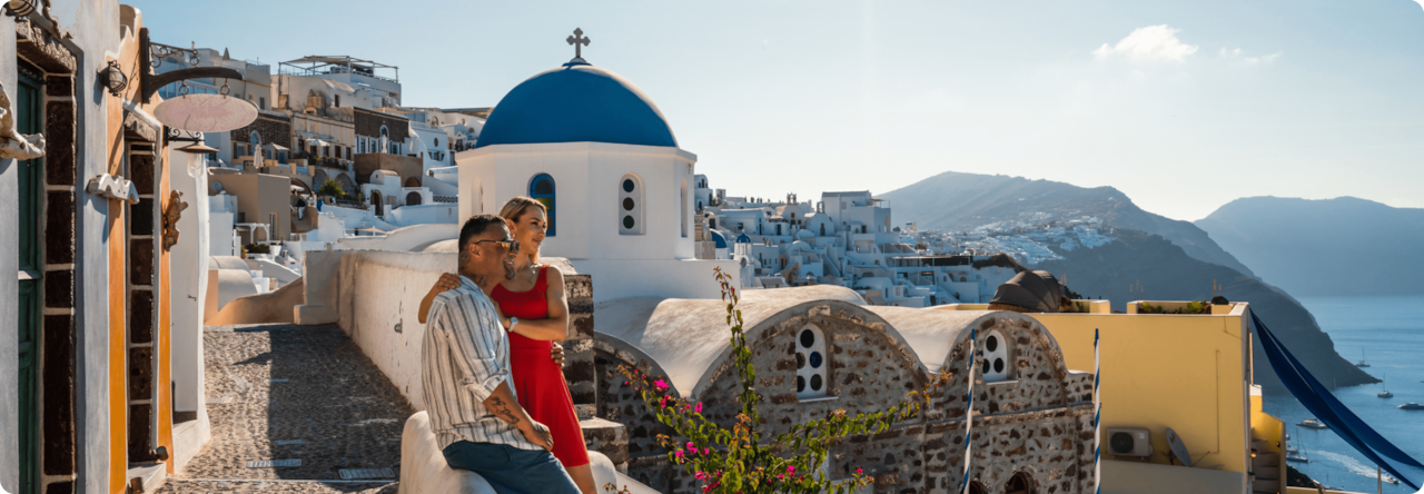 A couple in Greece looking on